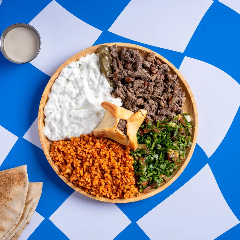 Shawar'Mama Lebanese plate: shawarma, hummus, tabbouleh and bulgur